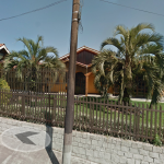 UM TERRENO COM ÁREA DE 2.761,18M², UMA CASA DE ALVENARIA E UM GALPÃO/MISTO.