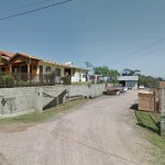 UM TERRENO COM ÁREA DE 2.761,18M², UMA CASA DE ALVENARIA E UM GALPÃO/MISTO.