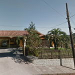 UM TERRENO COM ÁREA DE 2.761,18M², UMA CASA DE ALVENARIA E UM GALPÃO/MISTO.